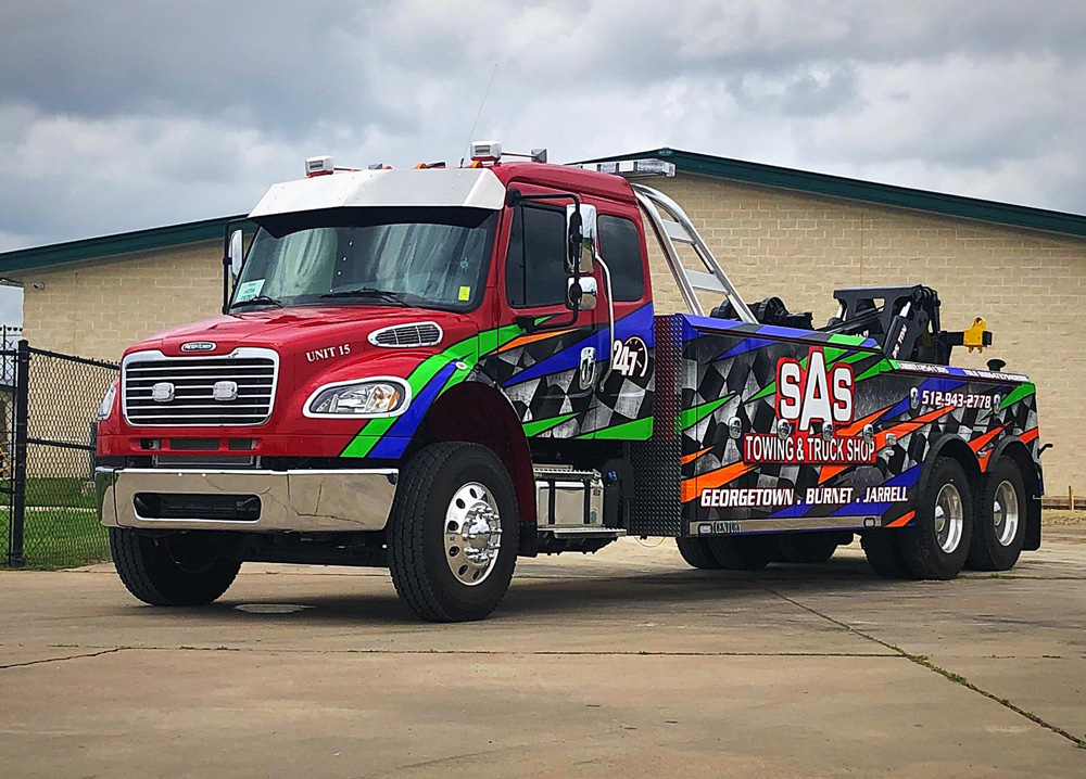 Commercial truck wrap on an Austin, Texas tow truck.