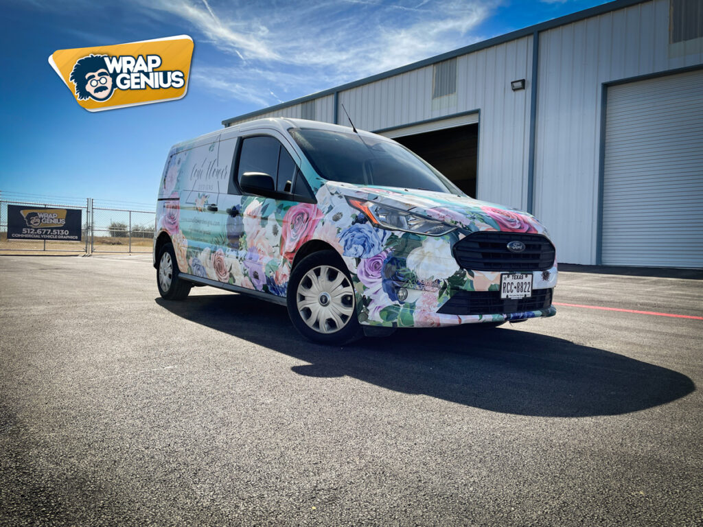 A van that has a floral vehicle wrap in Austin.